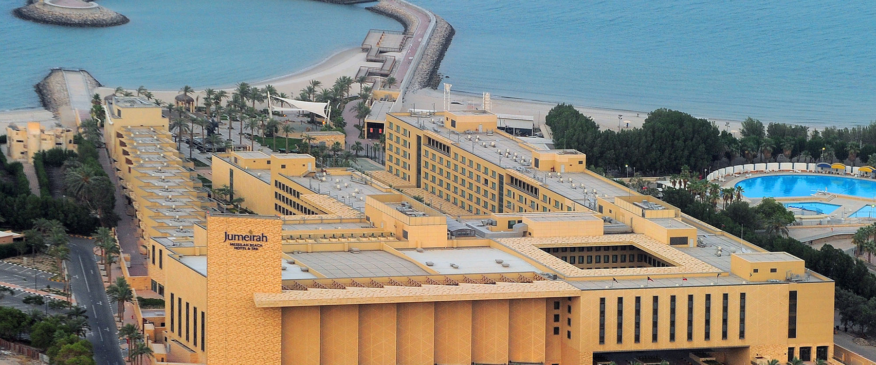 Jumeirah Messilah Beach Hotel exterior aerial view - KCPC